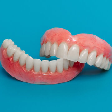 What Are Dentures? Types, Care & Benefits